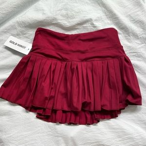 Gold Hinge pleated tennis skirt